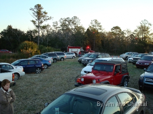  St. Mark's, FL Volunteer Fire Department and National Wildlife Refuge Association volunteers organize visitor parking on St. Mark's, FL heliport.  License plates were from over 30 counties in Florida, 6 states, and Canada.  Whooping Crane flyover, St. Mark's, Florida, January 17, 2009.