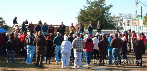  Operation Migration team hosts a question-and-answer session in St. Mark's, Florida, after leading 7 young Whooping Cranes over the village.  Brown-uniformed individuals at rear of crowd work at St. Mark's National Wildlife Refuge, winter home for the 7 Whooping Cranes.  Whooping Crane flyover, St. Mark's, Florida, January 17, 2009.